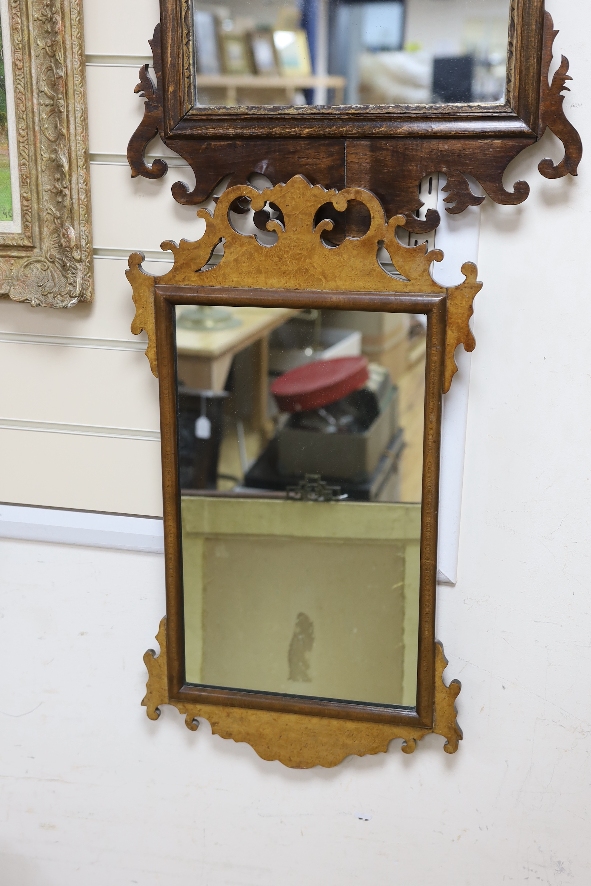 Two George III style fret cut wall mirrors, one with eagle surmount, tallest 85cm